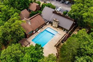 an overhead view of a house with a swimming pool at Indoor/Outdoor Pools!! Hot Tub! Steam Room! Sauna! in Osage Beach