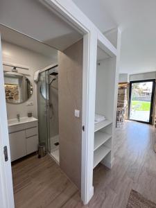 a bathroom with a shower and a sink in a room at Casona de Queveda in Queveda +200 photos