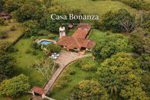 an aerial view of a house with a bridge at Hotel Boutique Casa Bonanza in Guamal