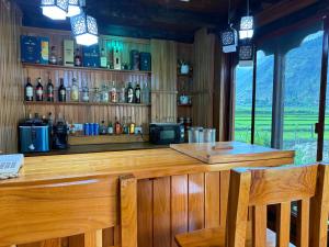 a bar with a view of a mountain at Tshang Tshang Villa in Paro +6 photos