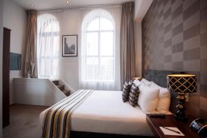 Katil atau katil-katil dalam bilik di Hotel 115