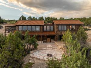 an aerial view of a house with a roof at Zion Mountain Ranch in Mount Carmel Junction