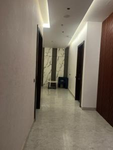 a hallway of an office building with a hallwayngth at Hotel route 54 in Bathinda