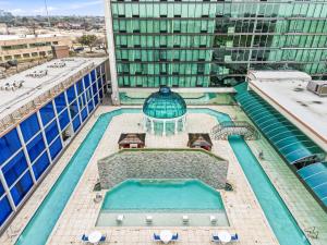 an overhead view of a building with a swimming pool at Grand Tuscany Hotel in Houston