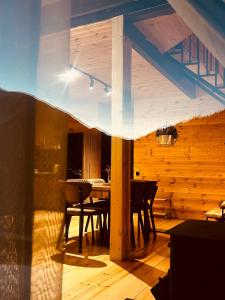 a dining room with a table and chairs at Mtis Racha in Oni +40 photos