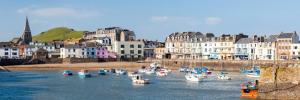 a group of boats in the water near a city at 3 Bed in Ilfracombe oc-s29585 in Ilfracombe