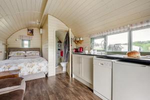 a bedroom in a tiny house with a bed at 1 Bed in Hereford oc-81293 in Aconbury