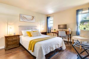 a bedroom with a bed and a chair and a desk at 2 Mi to CU Boulder: Mtn-View Condo w/ Pool Access in Boulder +28 photos