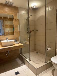 a bathroom with a shower and a sink at Villa Rena in Vourvourou +80 photos