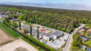 an aerial view of a building with a parking lot at Pino SeaView II in Gdańsk