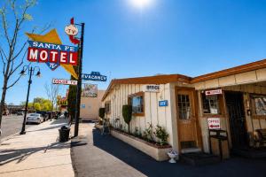 a motel on the side of a city street at Santa Fe Motel Tehachapi by Hotel O in Tehachapi