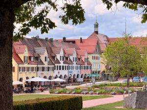 a street in a town with white buildings at MARKT14 City Apartment Marktplatz Freundenstadt in Freudenstadt