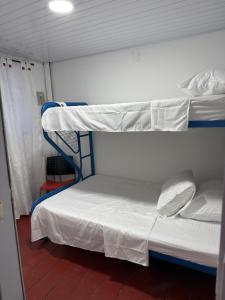 a couple of bunk beds in a room at El Respiro in Buenavista