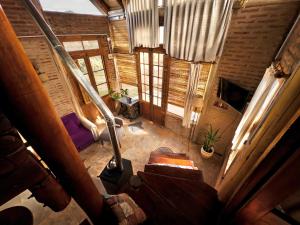 an overhead view of a living room in a log cabin at Arrullo del viento in Villa Yacanto