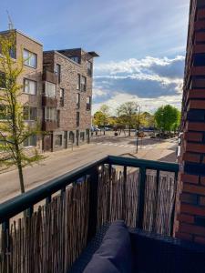 a balcony with a view of a city street at Apartment in Höganäs