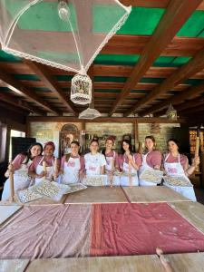 a group of women sitting on a table at Agriturismo Campo Rosso in Civitella di Romagna