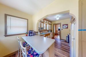 a kitchen with a large white counter top in a room at Enchanting Adobe in Lead +13 photos