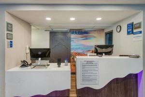 a lobby with a desk with a computer on it at Best Western Fishkill Inn & Suites in Fishkill +31 photos
