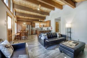 a living room with a couch and a table at Northstar Cabin Escape in Truckee