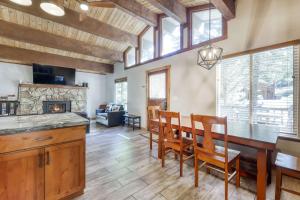 a kitchen and dining room with a table and chairs at Northstar Cabin Escape in Truckee +25 photos