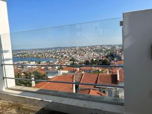 a view of a city from a balcony at Samos Vista Azzurra 1 in Samos