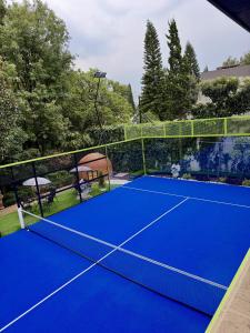 a tennis court that is on top at Casa Bosques in Mexico City