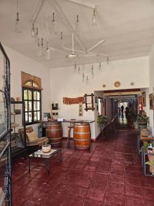a large room with barrels and a table in it at Los Toneles Cafayate in Cafayate