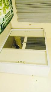 a window in the ceiling of a room at شقق مفروشة العزيزية in Hail +5 photos