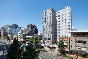 a view of a city with buildings and a street at KOKO HOTEL Kumamoto Kamitori in Kumamoto
