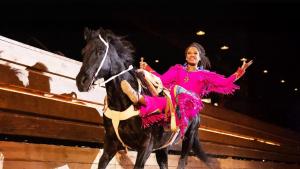 a woman riding a horse with a person on it at WP231 Old Mill Overlook in Pigeon Forge