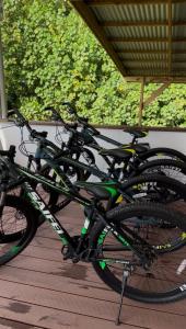 a group of bikes parked on a porch at Villa Blue Lagoon Tahaa in Tahaa