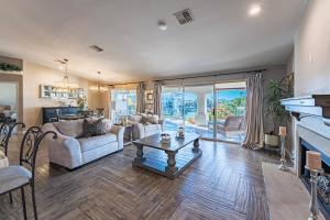 a living room with a couch and a table at Lake House in Fort Mohave