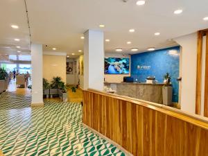 a lobby of a hospital with a waiting area and a reception at Hotel Caribbean Cartagena in Cartagena de Indias +114 photos