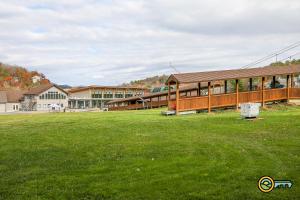 a school building with a field in front of it at Aspen East Unit #101 in Basye