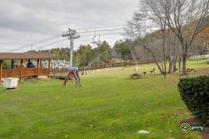 a park with a playground with a swing at Aspen East Unit #101 in Basye
