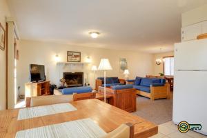 a living room with a couch and a table at Villa #114 in Basye