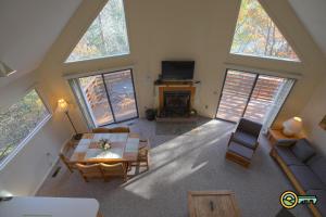 an overhead view of a living room with a table and chairs at Villa #364 in Basye