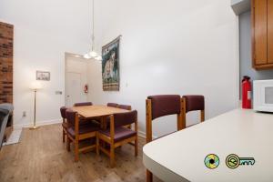 a kitchen and dining room with a table and chairs at Senedo Springs Duplex #101A in Basye