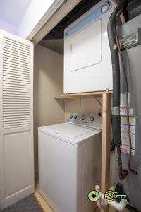 a washer and dryer in a laundry room at Senedo Springs Duplex #97A in Basye