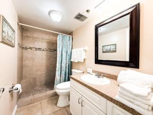 a bathroom with a sink and a toilet and a shower at Holiday villa 3 in Clearwater Beach +23 photos