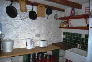 Kuhinja oz. manjša kuhinja v nastanitvi Cul Cottage
