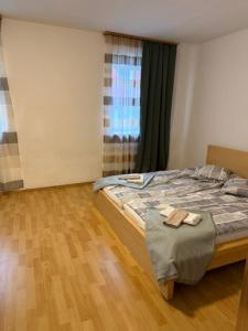 a bedroom with a bed with two towels on it at Thomas in Judenburg