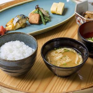 a table with bowls of rice and a plate of food at Hotel Monterey Kobe in Kobe +105 photos