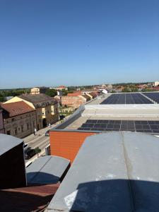 a group of solar panels on the roof of a building at APARTMAN PAVIĆ in Vinkovci