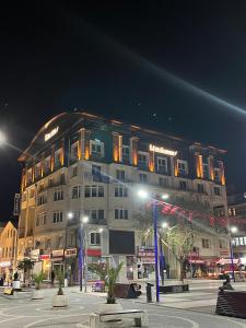a large building at night in a city at Görele Liva Otel in Görele