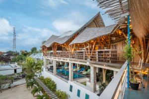 an aerial view of a resort with a swimming pool at Nusa View - Oceanfront Rentals in Nusa Lembongan