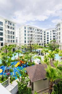 an aerial view of a resort with a water park at Legendary 2 Bdr Comfort in Bang Tao Beach