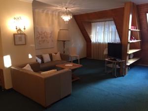 Svetainės erdvė apgyvendinimo įstaigoje Landhotel Forsthof