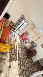 an overhead view of a kitchen and a living room at Illyrian Hotel in Lezhë