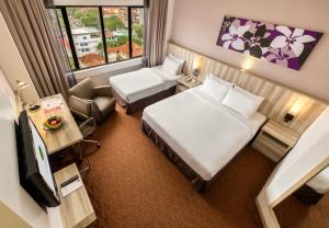 Postel nebo postele na pokoji v ubytování Sunway Hotel Georgetown Penang